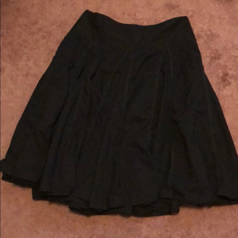Black pleated swing skirt